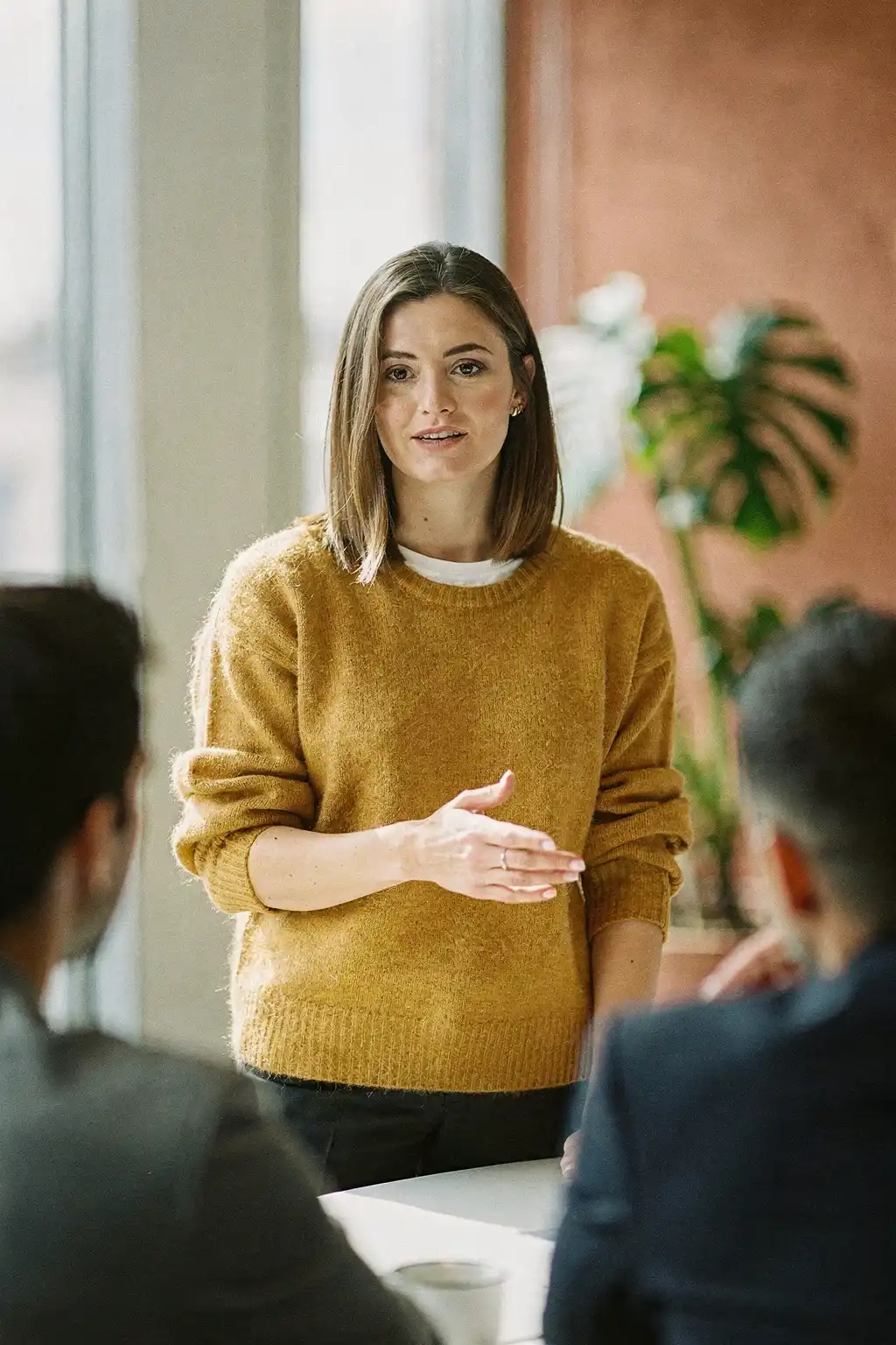 People leader discussing performance insights with a colleague.